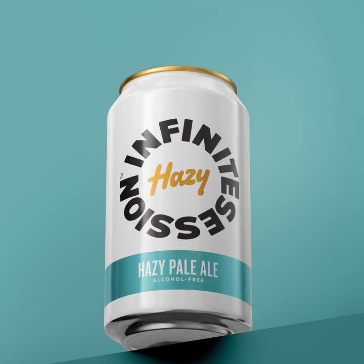 A single aluminum beverage can with a white body, teal band, gold lid, and black/yellow printed text reading &
